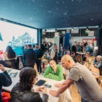 capture du stand de Primo conciergerie au salon de la franchise